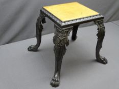 BARTLETT & SON CAST IRON FOOTMAN with lion's paw feet and later wooden top, 35cms H