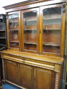 VICTORIAN MAHOGANY CWPWRDD GWYDIR having glazed doors and central panel to the top with interior