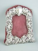 PIERCED SILVER PHOTOGRAPH FRAME with velvet mount, marks indistinct, possibly London (silver