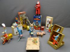 VINTAGE TYPE CLOCKWORK TIN PLATE TOYS (10) including circus and fairground and a boxed mechanical