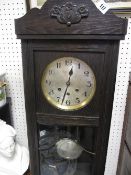 VINTAGE OAK CASED CHIMING WALL CLOCK with pendulum and key, 77cms H