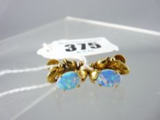 PAIR OF 14CT GOLD OPAL SET STUD EARRINGS, each having an oval cabochon opal, 8.7 x 6.5mm across