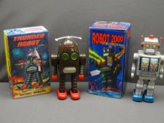 TWO BOXED BATTERY OPERATED ROBOTS, titled 'Robot 2000 the Millennium Robot' and 'Thunder Robot'