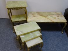 ONYX & BRASS TABLES ENSEMBLE to include a rectangular coffee table, a set of three side tables and a