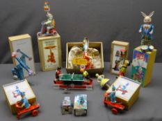 VINTAGE TYPE CLOCKWORK TIN PLATE TOYS (10) including circus and fairground items and a table