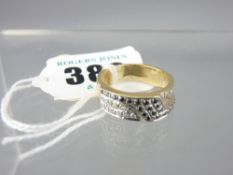 18CT YELLOW & WHITE GOLD BLACK & WHITE DIAMOND SET DRESS RING having twenty-two tiny diamonds of