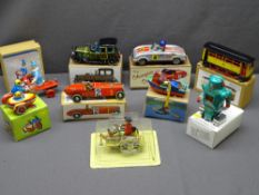 VINTAGE TYPE CLOCKWORK TIN PLATE TOYS (9), mainly vehicle based, one being a small robot