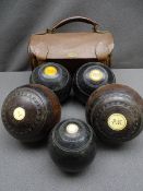 OLD SET OF BOWLS WITH JACK and a cased pair of bowls