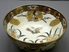 20TH CENTURY JAPANESE SATSUMA FRUIT BOWL decorated with birds and gilt panels, 16cms H, 36cms D