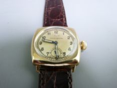CIRCA 1930's ROLEX OYSTER 9CT GOLD CUSHION CASED WRIST WATCH, the dial set with Arabic numerals