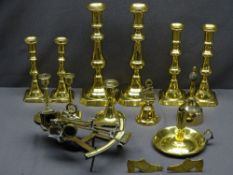 ANTIQUE & LATER BRASSWARE, a collection including a sextant type instrument, candlesticks and