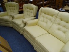 LAZYBOY THREE PIECE LOUNGE SUITE IN CREAM comprising two seater leather effect reclining sofa and