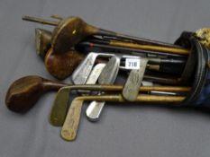 VINTAGE GOLF CLUBS - 'Holefast' putter, 'Bullock' and other similar era and an old split cane