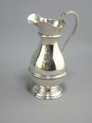 PLAIN SILVER CREAM JUG with circular base, narrow neck, initialled 'C E R', 3.8ozs, London 1905