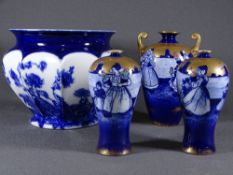 VINTAGE FLOW BLUE POTTERY including a jardiniere and three piece Dutch scene blue gilt and enamel