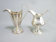 TWO SILVER CREAM JUGS - (1) helmet shaped with circular base, 3.4ozs, believed William IV, marks