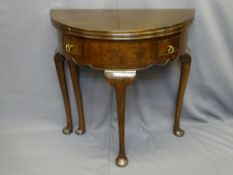 DEMI-LUNE FOLDOVER TABLE with gate-leg support and two front drawers, 74cms diameter opened, 77cms