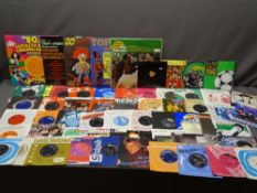 IAN DURY & THE BLOCKHEADS, Genesis and similar era 45s, also LPs including the Beach Boys' Pet