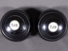 PAIR OF VINTAGE CROWN GREEN BOWLS ebonized with ivory thumb pieces, circa 1900