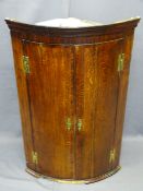 ANTIQUE BOW FRONT CORNER CUPBOARD