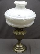 VINTAGE WHITE METAL & BRASS PARAFFIN LAMP with fancy moulded white glass shade, 30cms diameter