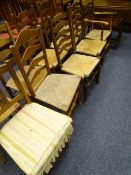 OAK GATE-LEG TABLE on turned supports and a mixed parcel of ladderback rush seated and other chairs