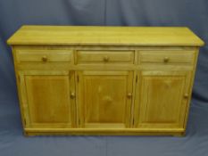 MODERN LIGHTWOOD SIDEBOARD, three drawers over two cupboard doors, 80cms H, 133cms W, 45cms D