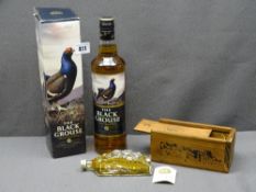 THE BLACK GROUSE 70CL blended whisky, boxed and sealed and Edinburgh Rock whisky, 10cl in wooden