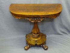FINE VICTORIAN ROSEWOOD FOLDOVER TEA TABLE on carved pedestal support, trefoil base and scrolled