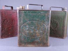THREE VINTAGE METAL FUEL CANS with screw-on caps, the tins marked 'Shell Mex' 'BP', 'Esso' and '