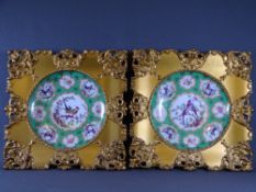 SCHMIDT & CO, AUSTRIA PORCELAIN PLATES, a pair, green ground with cartouche panels of birds and