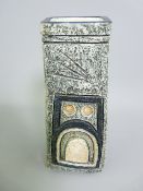 TROIKA COFFIN SHAPED VASE having an all over textured body with impressed Aztec style patterns in