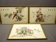 ORIENTAL SILK PICTURES - set of three depicting exotic birds, 35 x 55cms