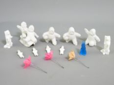 VINTAGE CHRISTMAS DECORATIONS - Bisque snow babies, early cake candle holders and similar