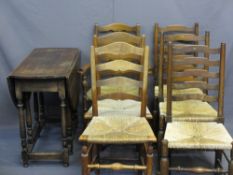PERIOD GATE-LEG TABLE on turned supports with a quantity of ladderback and rush seated chairs