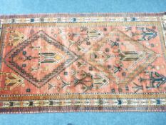 IRAN 100% WOOL PILE RUG - red ground with traditional repeating central pattern and Greek key