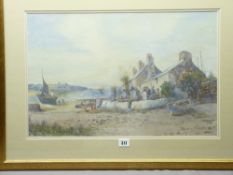 J HUGHES CLAYTON watercolour - 'Cottages at Cemaes, Anglesey' with numerous boats and figures,