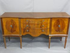 REPRODUCTION SIDEBOARD, bow front with three central drawers and two flanking cupboards