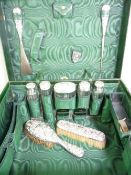 FINNIGANS MANCHESTER FITTED TRAVEL CASE & CONTENTS to include five London silver topped bottles, a