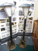 TWO GARDEN/STREET STYLE LAMPS in cast galvanized and wrought iron metal with domed top lamp covers