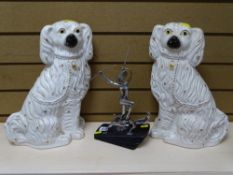 ART DECO STYLE METALLIC FIGURINE OF A LADY & HUNTING DOGS on a sloped wooden base, 33cms H and a