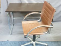 DESIGNER OFFICE FURNITURE comprising chrome and vinyl top desk of plain form and a leather effect