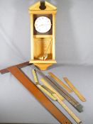 KNIGHT & GIBBINS OF LONDON MODERN PINE PENDULUM WALL CLOCK and a quantity of vintage rules ETC