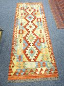 VEGETABLE DYE WOOL CHOBI KILIM RUNNER - vibrant stylized multicolour pattern within a double border,