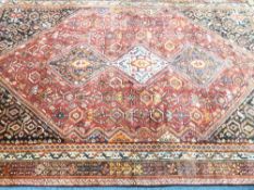TRADITIONAL IRAN 100% WOOL PILE RUG - red ground with central diamond block pattern and multi-