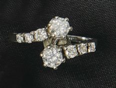 Brillantring1970er JahreSchmale Schiene mit bewegter Schauseite, besetzt mit acht Diamanten im