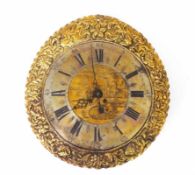 Barocke Telleruhr18. Jh.Der Ziffernring mit römischen Zahlen umrahmt von Reif mit hochgetriebenem