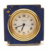 Cartier-ReiseweckerUm 1985Quadratische Form mit ausgesägten Ecken, rundes Uhrengehäuse mit weißem