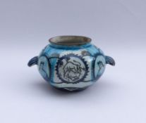 PotMiddle EastWith two shell-like handles; on the corpus medallions with bust of a woman