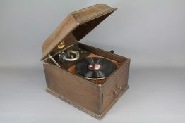 A Vintage HMV Record Player together with a Selection of 78 rpm Records